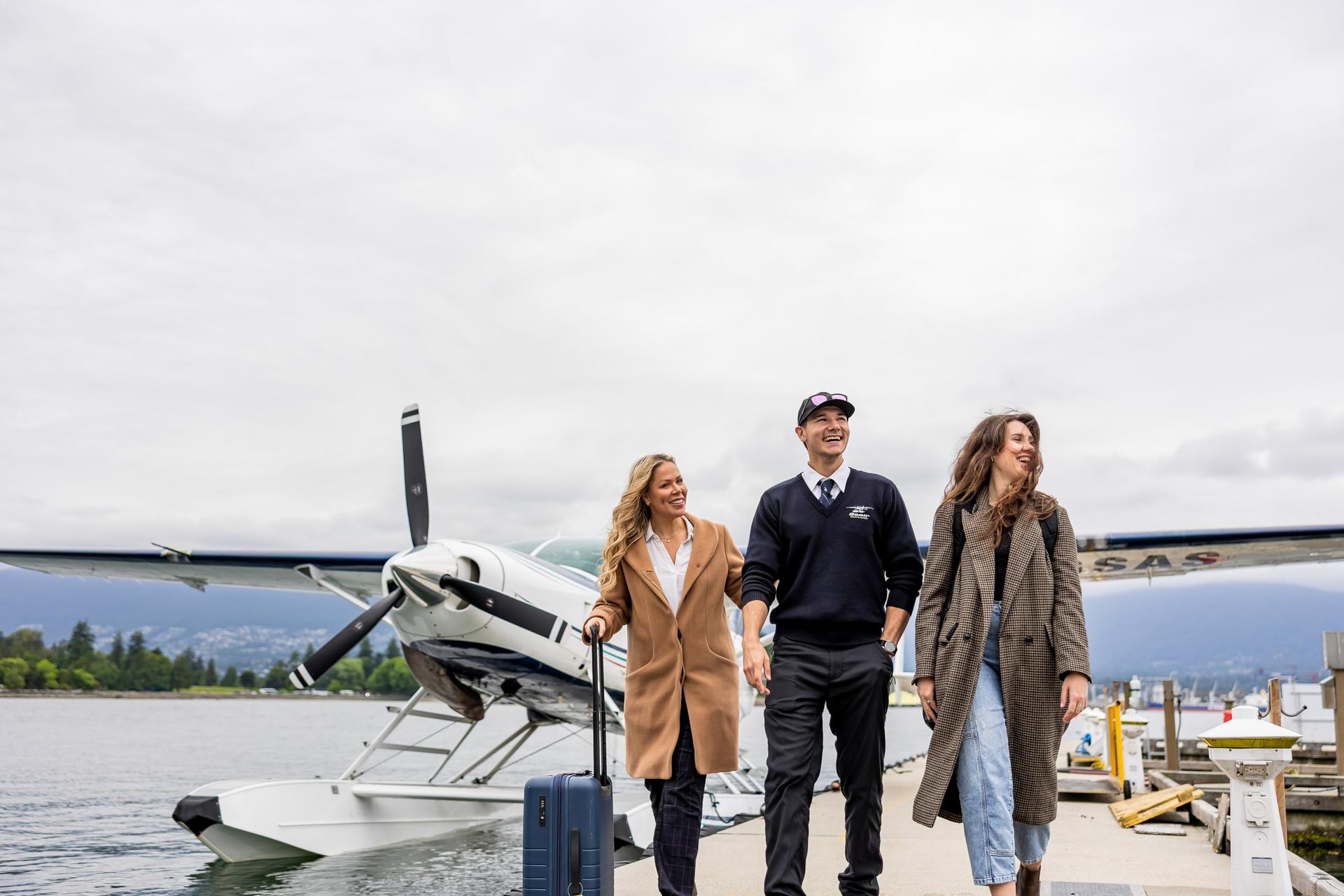Pilot walking passengers on the dock as they arrive.